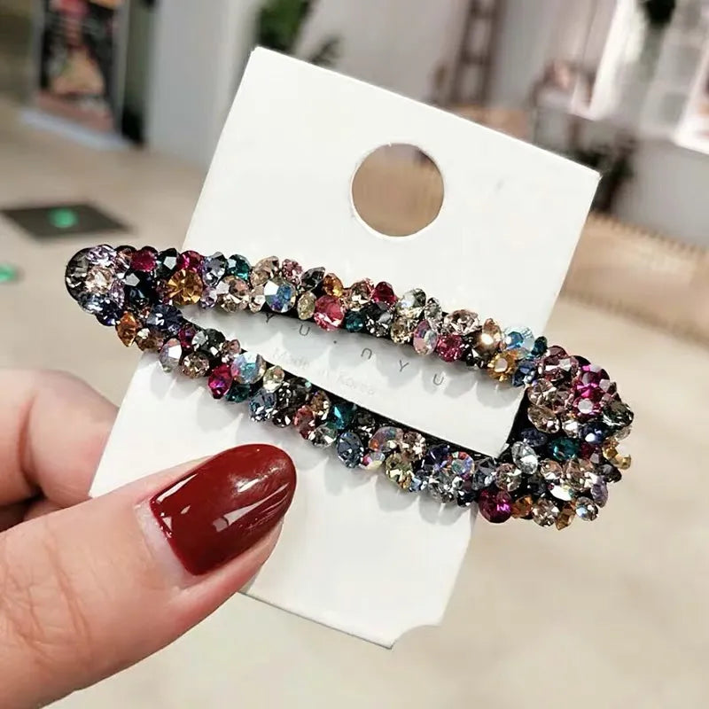 Pince à cheveux en métal Argenté orné d'un nœud en strass (longueur 5,5 cm Pince à cheveux en métal Argenté orné d'un nœud en strass (longueur 5,5 cm